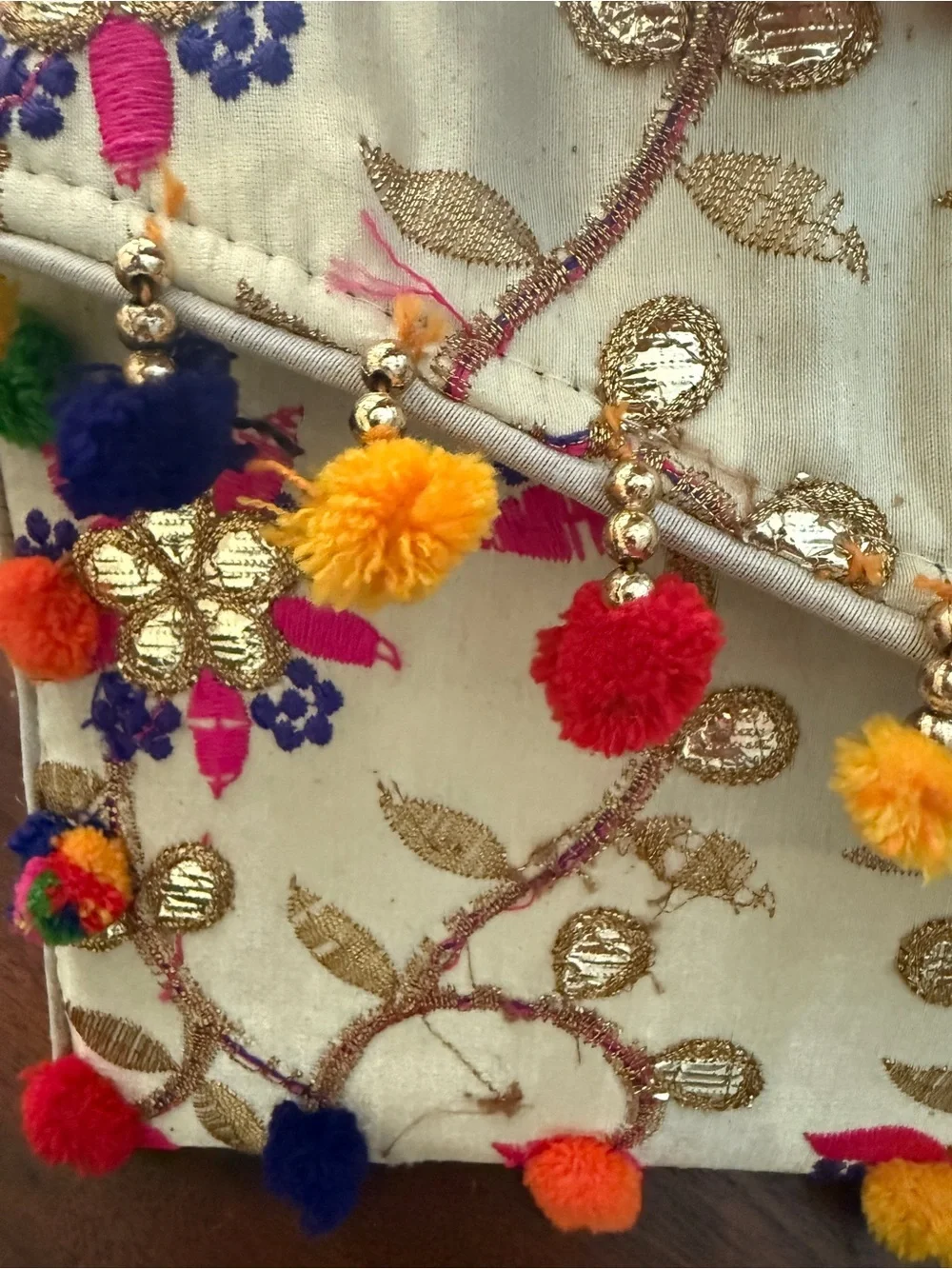 Anthropologie Embroidered Cream Clutch with Multicolor Pom Poms